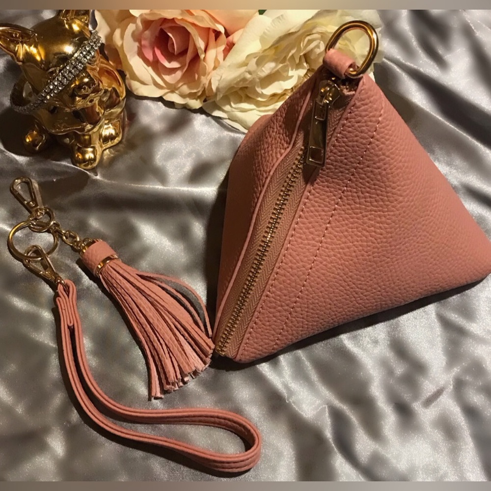 Posh style, pyramid shaped, leather wristlet.